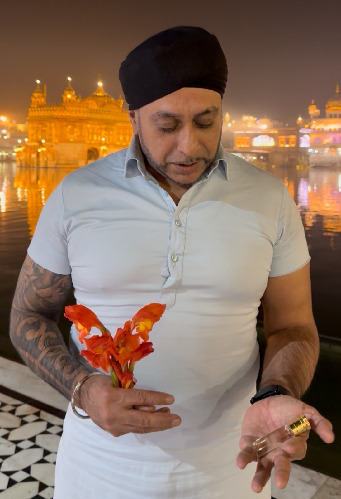 Receiving attar (sacred fragrance) and flowers from Sri Harmandir Sahib (Golden Temple), Amritsar